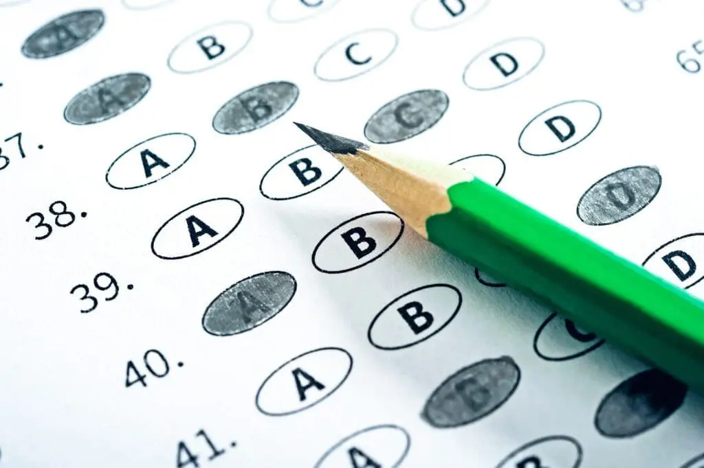 Standardized test paper with green pencil img