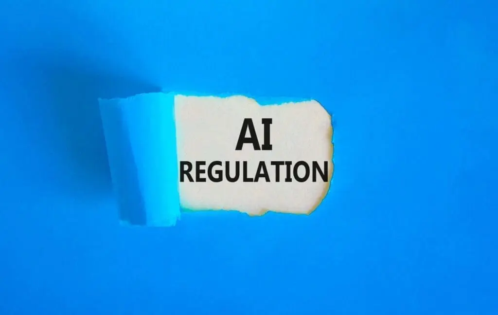 AI Regulation text paper cutout img