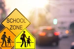 School zone and pedestrian crossing road signs