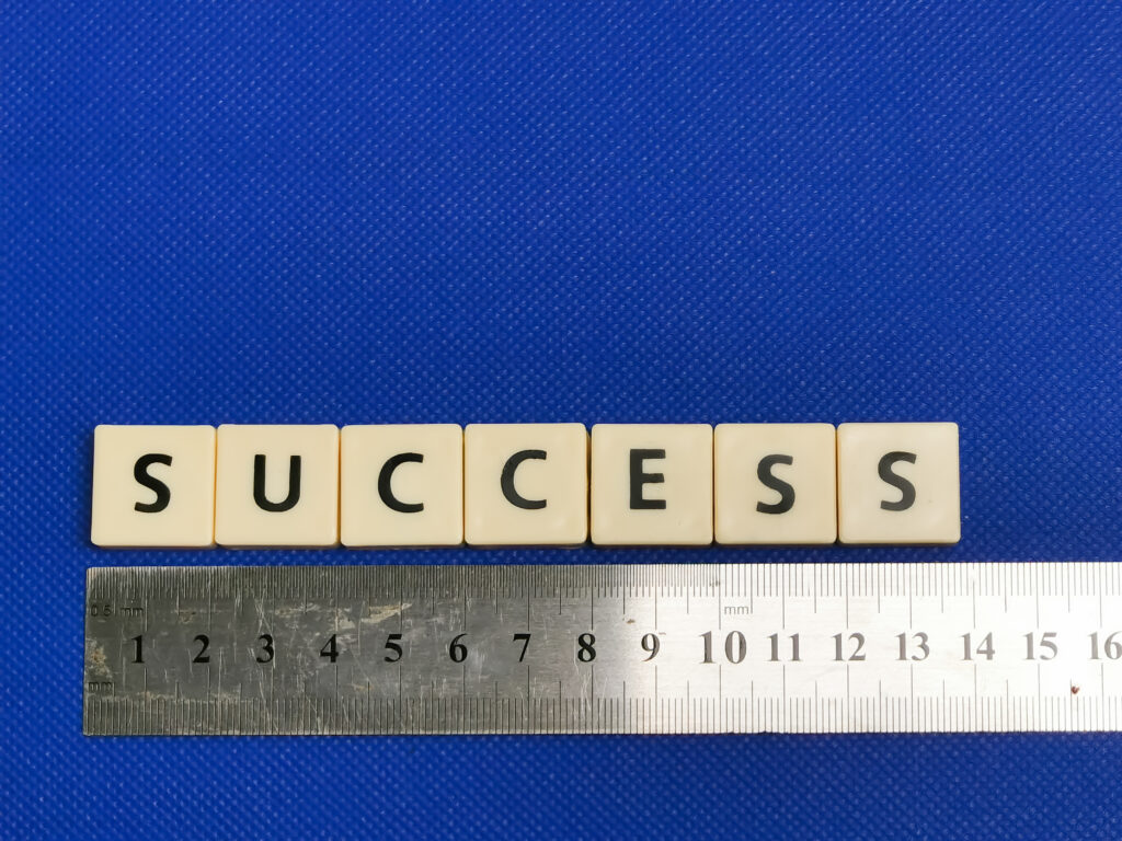 Success letters above ruler img