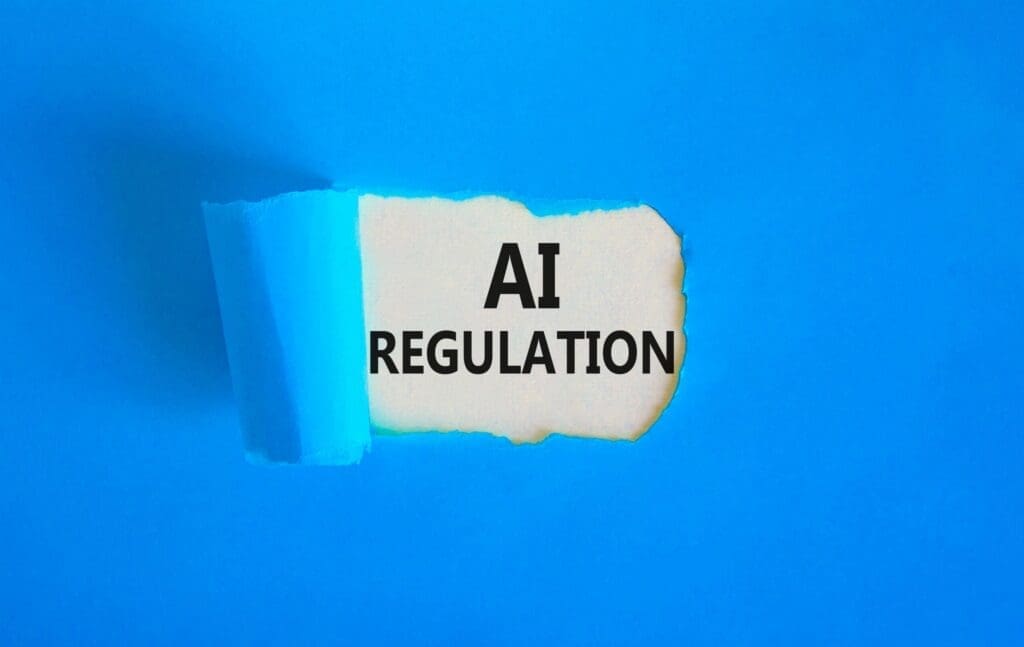 AI Regulation text paper cutout img