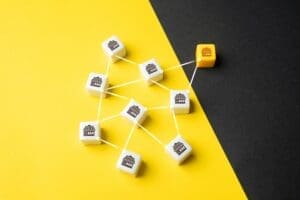 Sales territory planning concept store icon blocks on yellow black background img